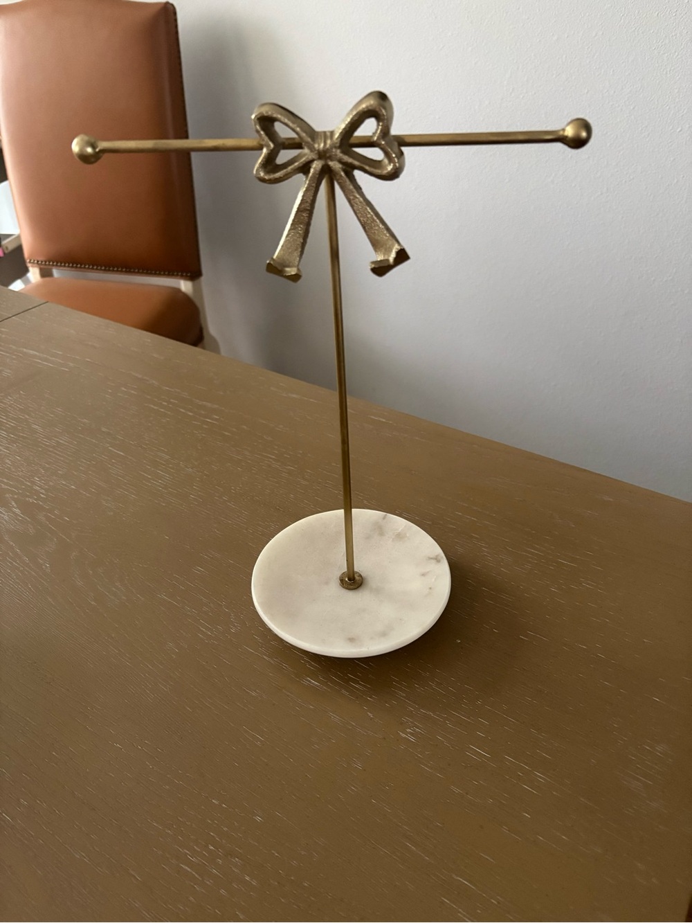 Gold Bow Jewelry Stand with White Marble Dish